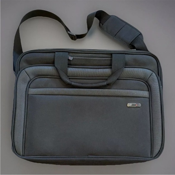 Sleek Gray Briefcase with Adjustable Strap and Durable Fabric - Picture 1 of 11